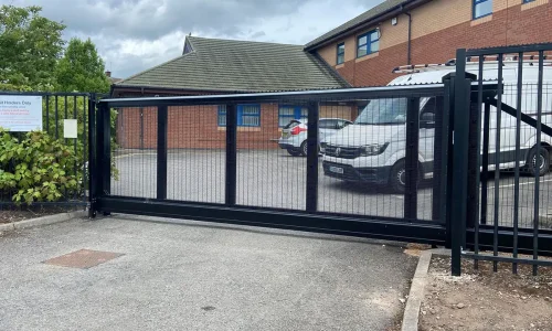 A modern sliding driveway gates by Gates Wellington, providing a sleek and secure access solution. A modern sliding driveway gates by Gates Wellington, providing a sleek and secure access solution.